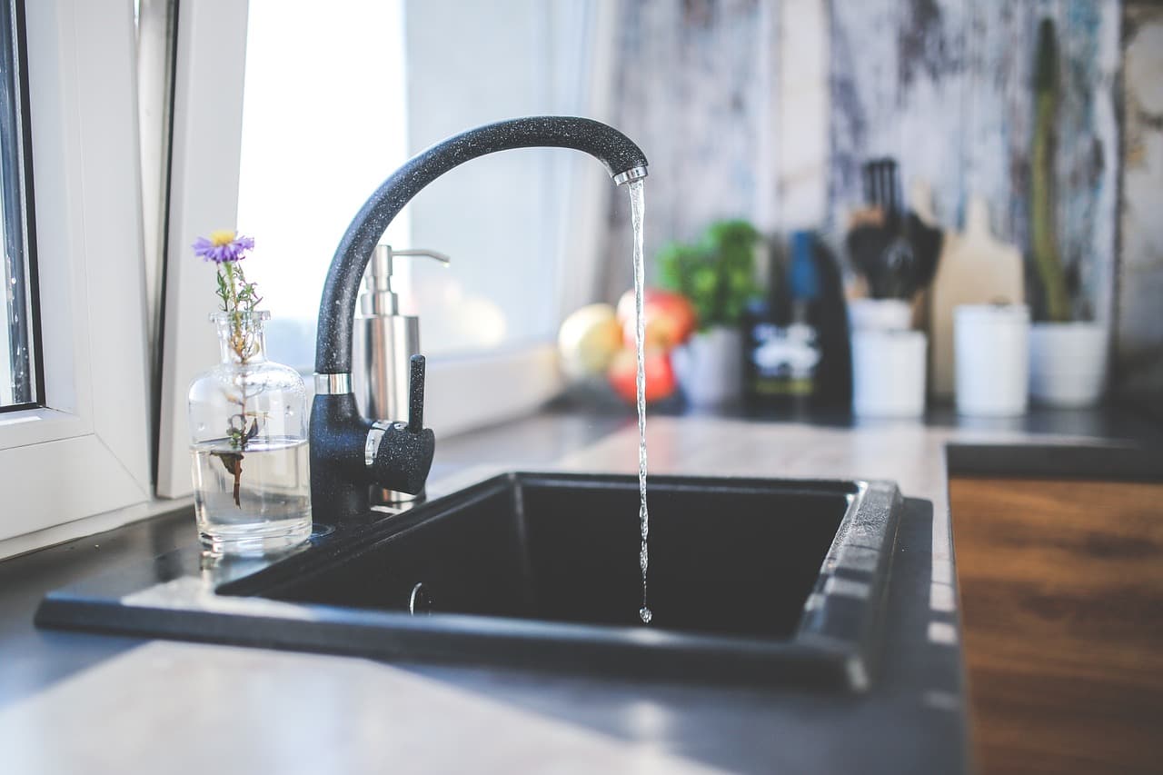 Image of a tap with running water